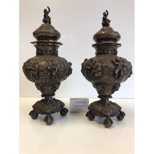 1 - A pair of large late Victorian profusely detailed balluster form hallmarked silver sugar casters or ... 