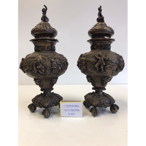 1 - A pair of large late Victorian profusely detailed balluster form hallmarked silver sugar casters or ... 