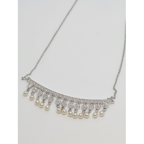 402 - 18ct Diamond and Pearl Necklace, 5.2g, 38cm.