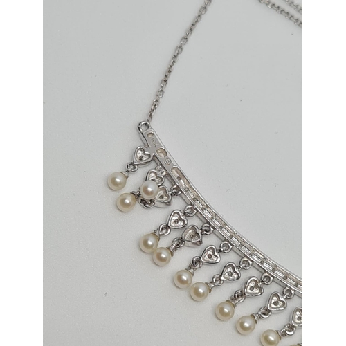 402 - 18ct Diamond and Pearl Necklace, 5.2g, 38cm.