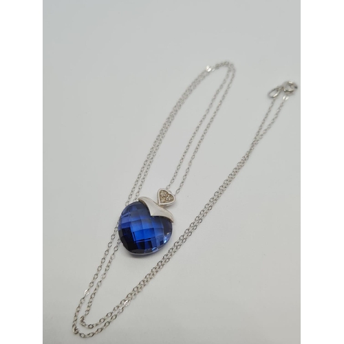 494 - 9ct Blue Stone Pendant and Chain, 42cm