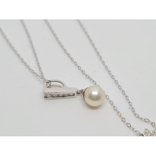 499 - 18ct Diamond and Pearl Pendant 42cm, 9ct Gold Chain