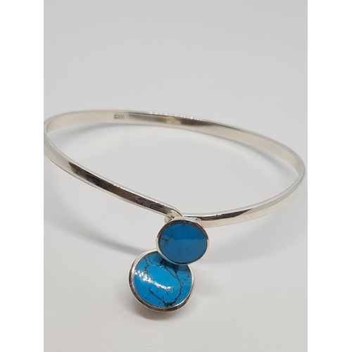 519 - Silver and Turquoise Bangle, 14ct