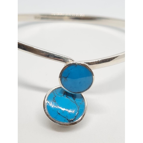 519 - Silver and Turquoise Bangle, 14ct