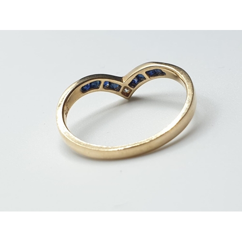 175 - 9ct yellow gold diamond and sapphire wishbone ring size M weight 1.5g