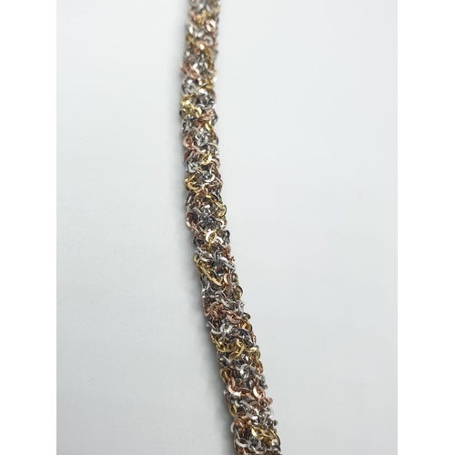 179 - Three colour silver larriot style necklace, weight 52g and 86cm long approx