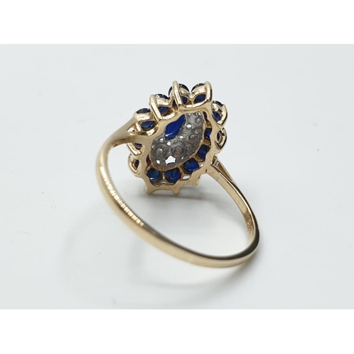 290 - 9ct yellow gold diamond and sapphire cluster ring, weight 2.2g and size M1/2