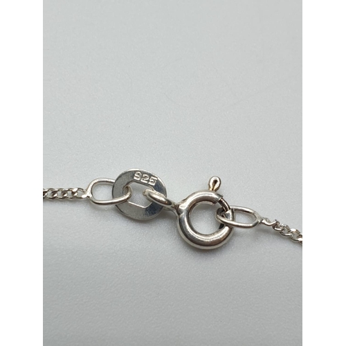 333 - sterling silver chain with large folding ornate pendant