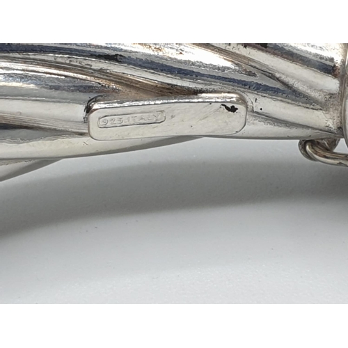 386 - sterling silver twisted bangle, weight 20g and 7.5cm wide