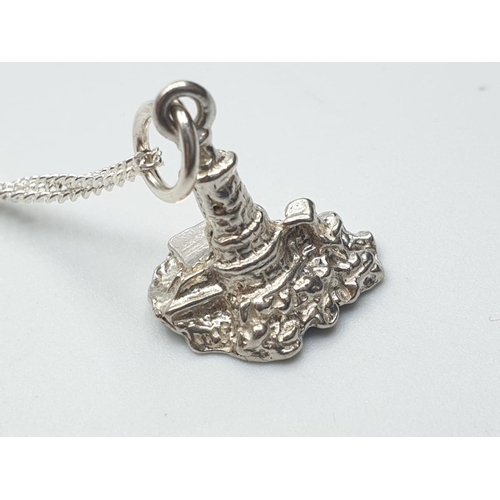 477 - sterling silver chain with a lighthouse pendant, weight 3.8g