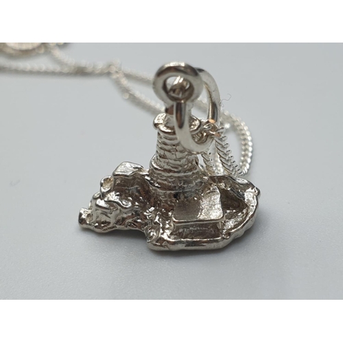 477 - sterling silver chain with a lighthouse pendant, weight 3.8g