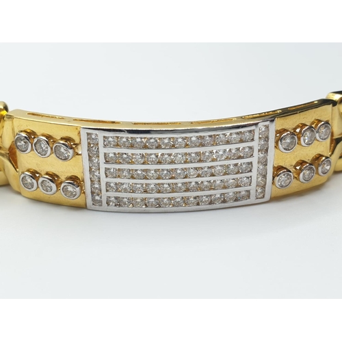 98 - 18ct diamond encrusted bracelet, weight 54.2g and 34cm long