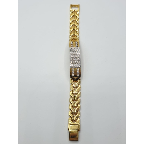 98 - 18ct diamond encrusted bracelet, weight 54.2g and 34cm long