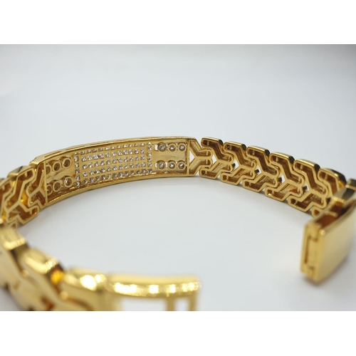 98 - 18ct diamond encrusted bracelet, weight 54.2g and 34cm long