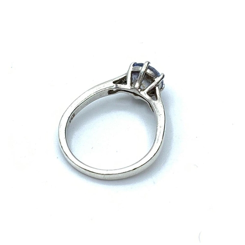 626 - Silver ring having sparkling faceted blue topaz coloured solitaire in a six claw mount. Marked 925 s... 