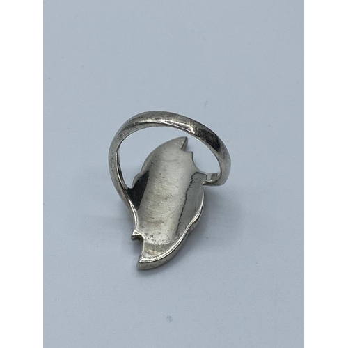 638 - Silver ring unusual shape having four enamel coloured panels to top mount. Marked 925 silver, size L... 