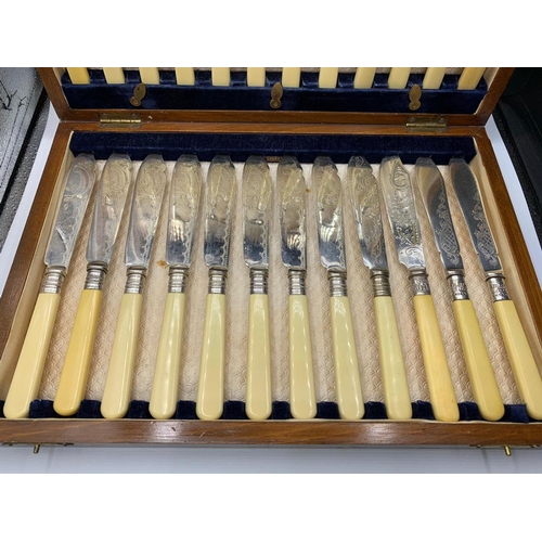 663 - 24 piece set of cutlery in original wooden canteen. Consisting 12 fish knives and 12 forks with silv... 