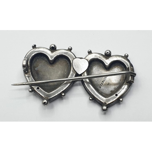 513 - Silver double heart brooch. Unusual mizpah brooch having two connected hearts with birds and flowers... 