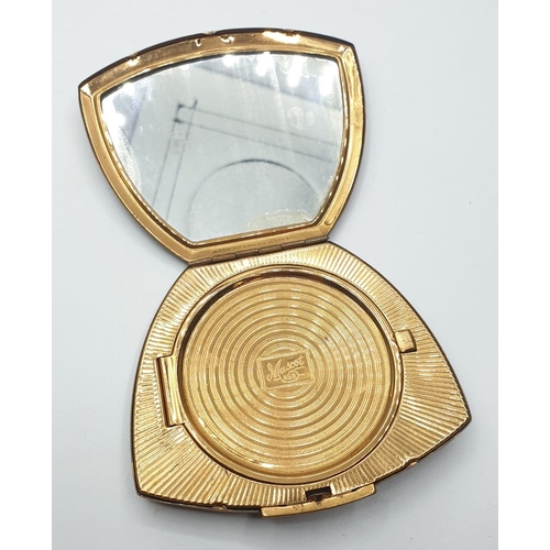 539 - Pair of 1950s/60s compacts. Both having mirrored lids. Gold colour by mascot. Silver colour by Kigu