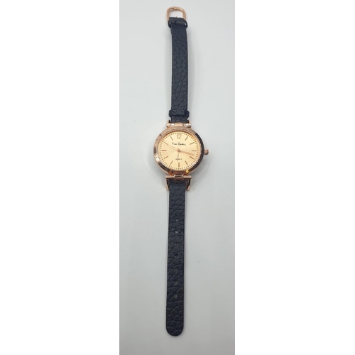 546 - Pierre Cardin ladies quartz wristwatch. Rose gold colour with black strap Original box and paperwork... 