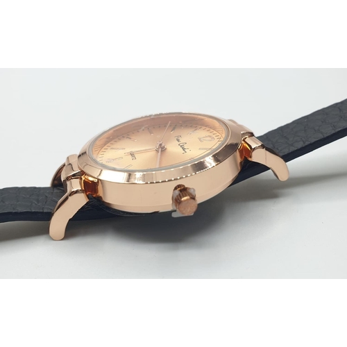 546 - Pierre Cardin ladies quartz wristwatch. Rose gold colour with black strap Original box and paperwork... 