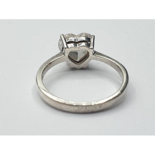 559 - Silver ring with large Zirconia heart solitaire in faceted form with a four claw setting. 925 silver... 