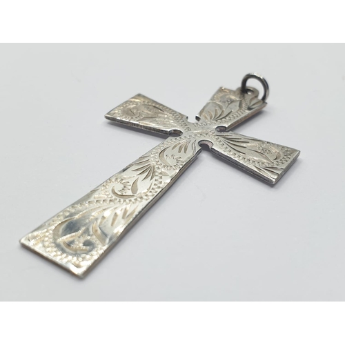 602 - Vintage silver cross in unusual flat form with attractive engraving to front. Classic piece. Clear h... 