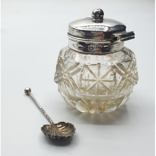 634 - Antique cut glass and silver condiment set. Consisting salt, oil, bottle with stopper and mustard ja... 