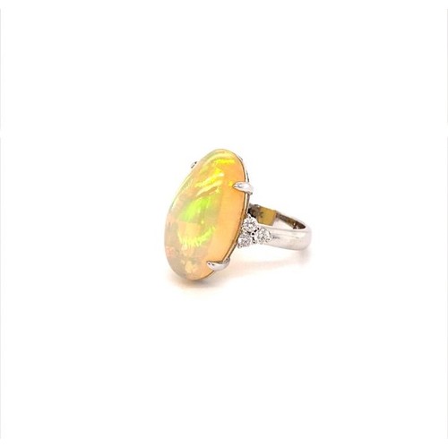 802 - 18K OPAL RING (Oval Ethiopian cabochon 8ct opal) and diamonds, weight 6.04g and size M1/2 (DCR73)