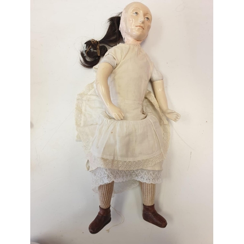 35 - A Collection of Antique Jointed Dolls.