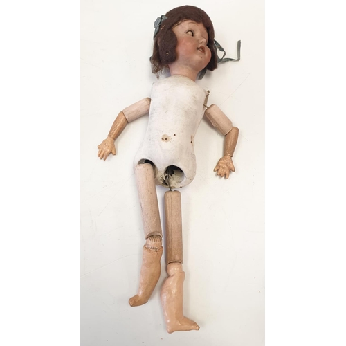 35 - A Collection of Antique Jointed Dolls.