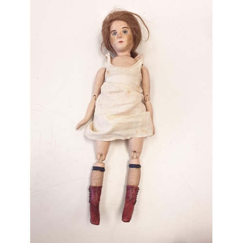 35 - A Collection of Antique Jointed Dolls.