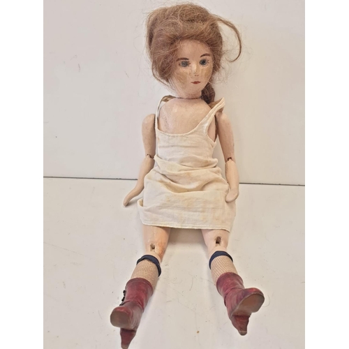 35 - A Collection of Antique Jointed Dolls.