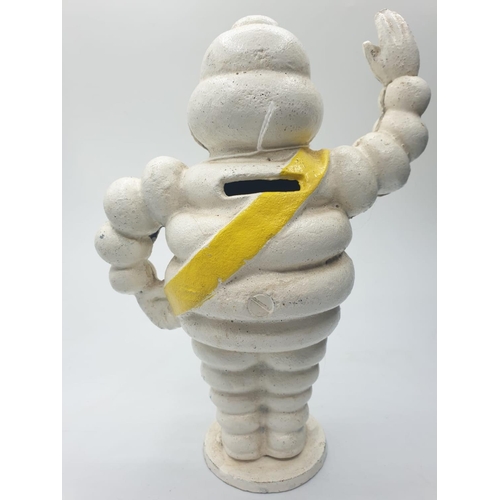 46 - A vintage French cast iron MICHELIN MAN money box. Height: 22.5cm (Not to be confused with modern im... 