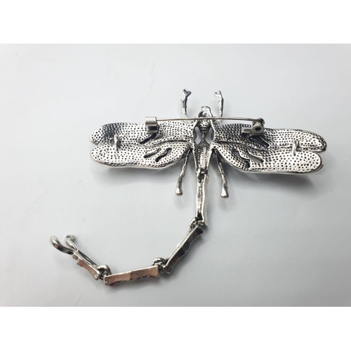 92 - Three large dragonfly brooches in a wooden box. Enamel applied by hand on various metals with imitat... 