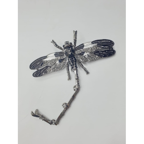 92 - Three large dragonfly brooches in a wooden box. Enamel applied by hand on various metals with imitat... 