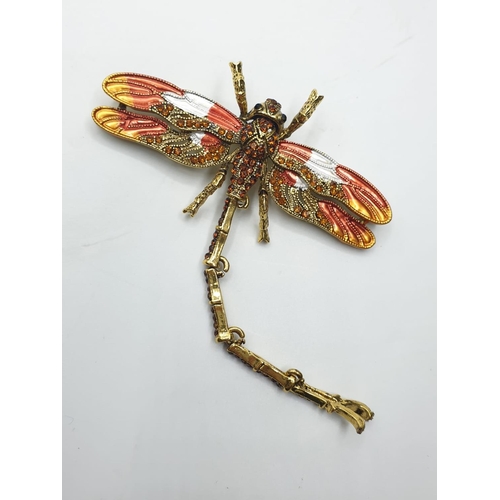 92 - Three large dragonfly brooches in a wooden box. Enamel applied by hand on various metals with imitat... 