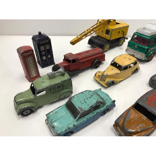 66 - A quantity of Dinky die cast vehicles including a Tardis and a red phone box