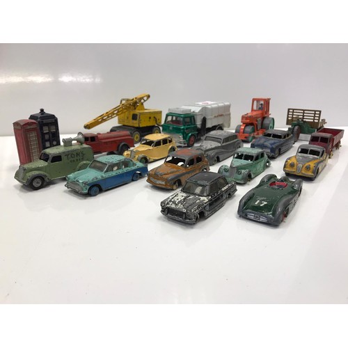 66 - A quantity of Dinky die cast vehicles including a Tardis and a red phone box