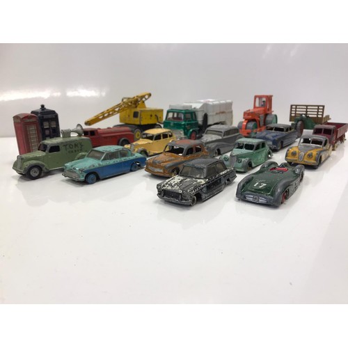 66 - A quantity of Dinky die cast vehicles including a Tardis and a red phone box