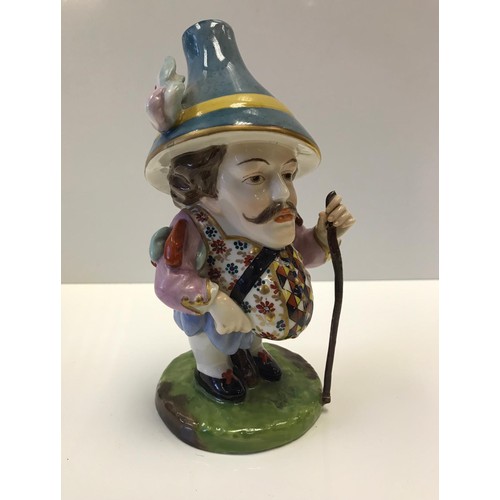 417 - A Derby style Falstaff figurine. Damage to walking cane.