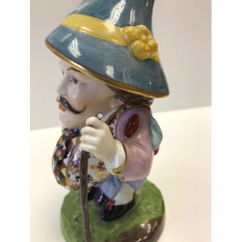 417 - A Derby style Falstaff figurine. Damage to walking cane.