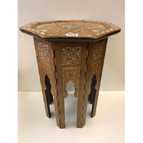 258 - An octagonal Moroccan inlaid M.O.P side table, H53.5cm x W40cm