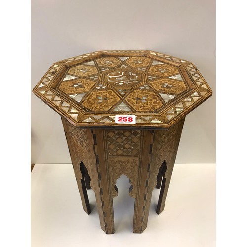 258 - An octagonal Moroccan inlaid M.O.P side table, H53.5cm x W40cm