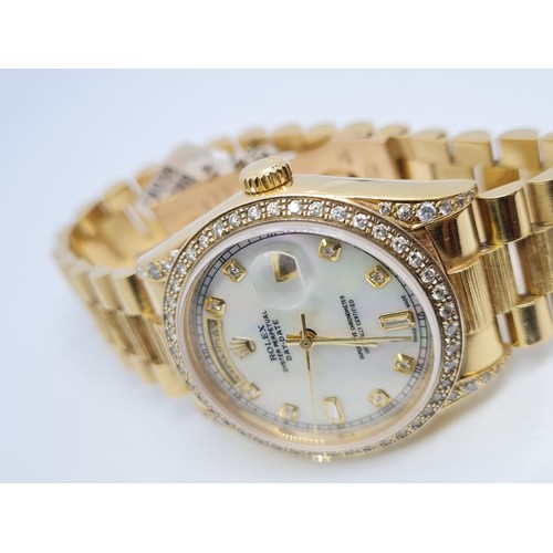 32 - 18ct Rolex Day-Date 36mm Costumed Diamond Shoulders and Bezel. 1987 Model. Come with box, no paper.