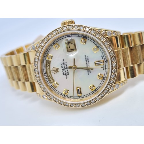 32 - 18ct Rolex Day-Date 36mm Costumed Diamond Shoulders and Bezel. 1987 Model. Come with box, no paper.