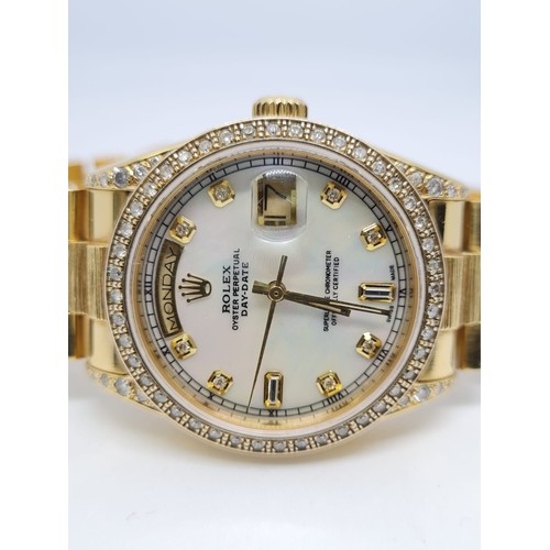 32 - 18ct Rolex Day-Date 36mm Costumed Diamond Shoulders and Bezel. 1987 Model. Come with box, no paper.