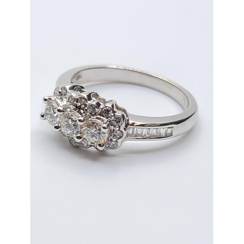 300 - 18ct white gold diamond cluster ring, weight 4.5g and 0.60ct diamonds approx size M