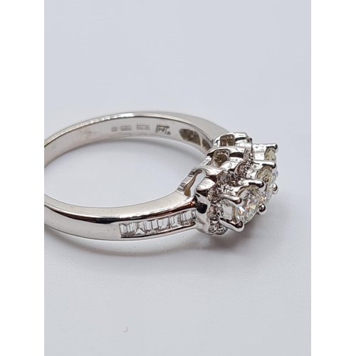 300 - 18ct white gold diamond cluster ring, weight 4.5g and 0.60ct diamonds approx size M