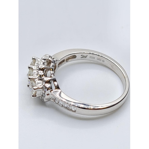 300 - 18ct white gold diamond cluster ring, weight 4.5g and 0.60ct diamonds approx size M